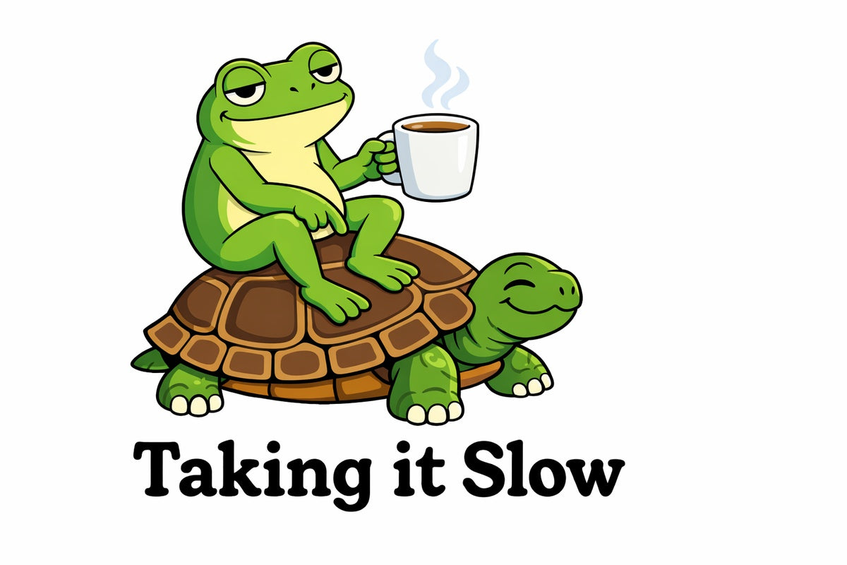 Cartoon frog sitting on a turtle with a cup of coffee, text 'Taking it Slow' below.